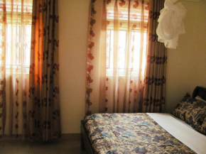 Отель Sadrina Comfort Cottages  Кампала